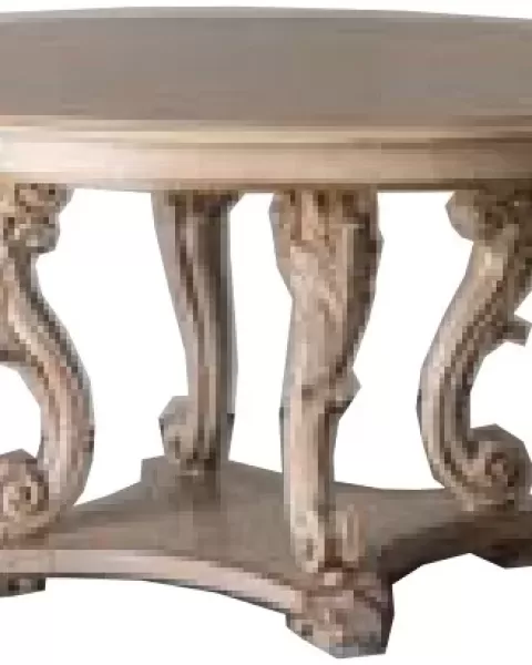 Gran Guardia Round Table with Carved Legs by Francesco Pasi, table facing a curio cabinet