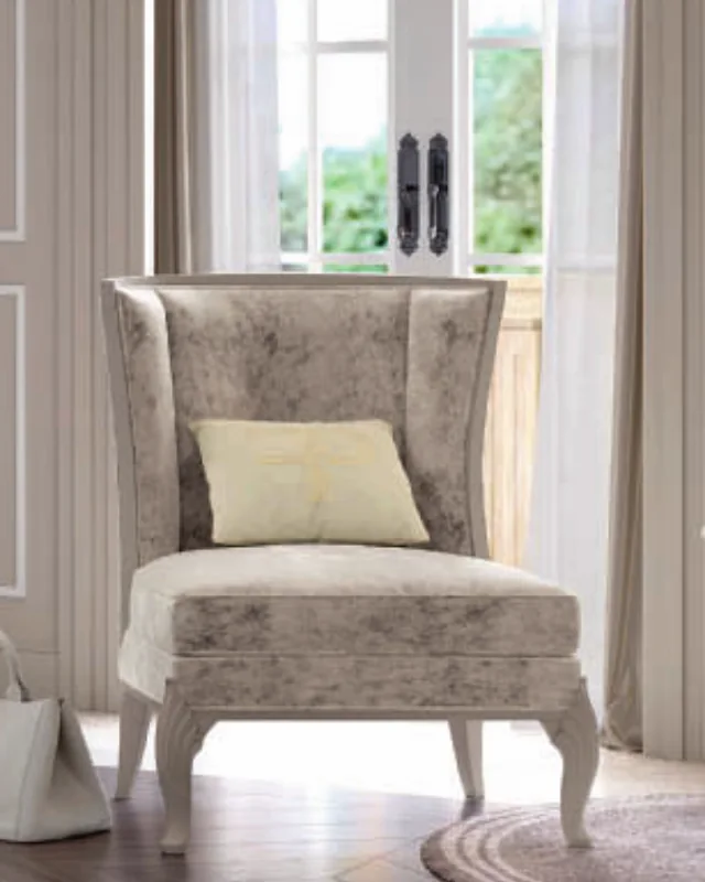 Ocean Armchair, Hand-carved legs by Francesco Pasi, in an interior setting, photo 1 of 2