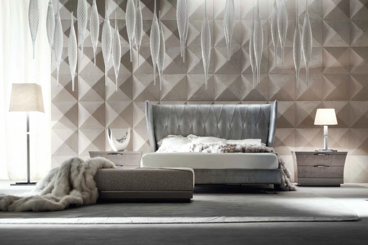 Bedroom with a quilted leather headboard against a diamond-panel wall, high end Italian furniture in London