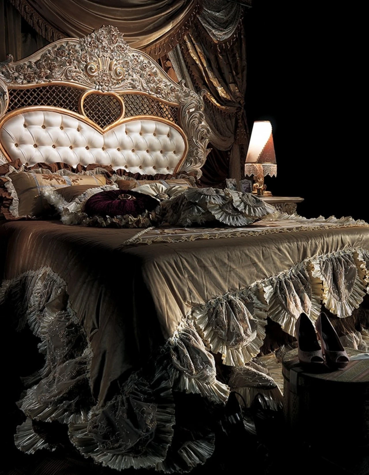 Carved gilded bed with a capitonné headboard and a ruffled bedspread, Italian furnishings for Rome homes