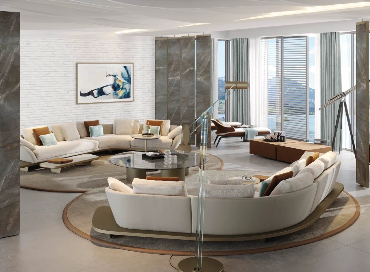 Two curved cream sofas facing each other around a round table, luxury European furniture